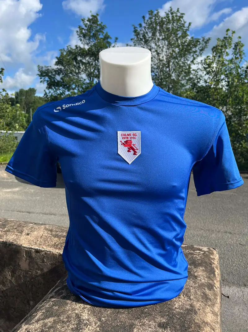 Royal blue cricket training top embroidered with the Colne CC club crest, kit for one of Pendle's local clubs